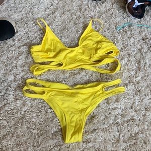 Bright yellow swim suit, worn once